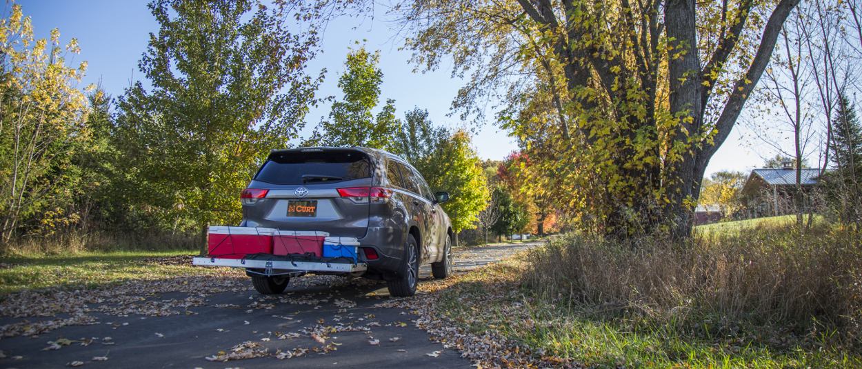 CURT trailer hitch on minivan with cargo carrier