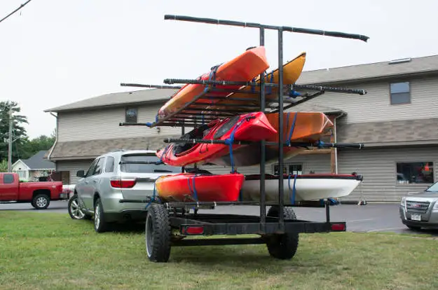 SUV Towing Kayak Trailer Parking Lot